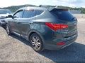 2014 Hyundai Santa Fe — photo 3 of 18 | VIN 5XYZW3LA6EG130989