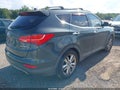 2014 Hyundai Santa Fe — photo 4 of 18 | VIN 5XYZW3LA6EG130989