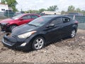 2013 Hyundai Elantra — photo 2 of 17 | VIN 5NPDH4AE6DH285131