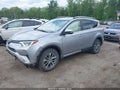 2018 Toyota RAV4 Hybrid — photo 2 of 16 | VIN JTMRJREVXJD203355