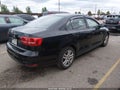 2015 Volkswagen Jetta — photo 4 of 16 | VIN 3VW2K7AJ7FM247389