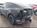 2024 Tesla Model Y — photo 18 of 21 | VIN 7SAYGDED7RF018529