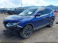 2019 Nissan Rogue — photo 2 of 18 | VIN 5N1AT2MV9KC735425