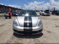 2012 Volkswagen Beetle — photo 13 of 17 | VIN 3VWJP7AT7CM628881
