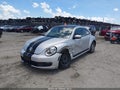 2012 Volkswagen Beetle — photo 6 of 17 | VIN 3VWJP7AT7CM628881