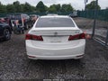 2017 Acura TLX — photo 16 of 21 | VIN 19UUB2F3XHA001205
