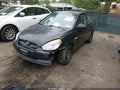 2011 Hyundai Accent — photo 2 of 11 | VIN KMHCM3AC9BU190593