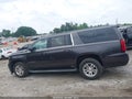 2016 Chevrolet Suburban — photo 14 of 16 | VIN 1GNSKHKC3GR432667