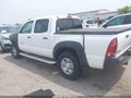 2014 Toyota Tacoma — photo 14 of 16 | VIN 3TMJU4GN1EM157493