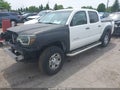 2014 Toyota Tacoma — photo 2 of 16 | VIN 3TMJU4GN1EM157493