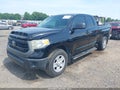 2014 Toyota Tundra — photo 2 of 21 | VIN 5TFRM5F12EX073720