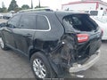 2015 Jeep Cherokee — photo 6 of 14 | VIN 1C4PJLCB5FW547443