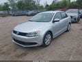 2014 Volkswagen Jetta — photo 2 of 11 | VIN 3VWD17AJ0EM244893