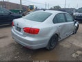2014 Volkswagen Jetta — photo 4 of 11 | VIN 3VWD17AJ0EM244893