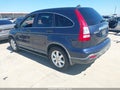 2009 Honda CR-V — photo 3 of 11 | VIN JHLRE385X9C005523