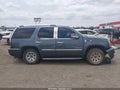 2010 Cadillac Escalade — photo 12 of 15 | VIN 1GYUKAEF8AR175957