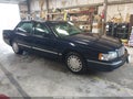 1997 Cadillac Deville — photo 1 of 11 | VIN 1G6KD54Y8VU299864