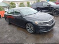 2021 Volkswagen Passat — photo 1 of 17 | VIN 1VWSA7A32MC000431