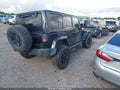 2014 Jeep Wrangler Unlimited — photo 4 of 19 | VIN 1C4BJWEGXEL283172