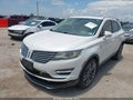 2015 Lincoln MKC — photo 2 of 16 | VIN 5LMCJ1A94FUJ29303