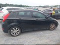 2012 Hyundai Accent — photo 13 of 16 | VIN KMHCU5AE9CU039879