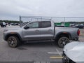 2023 GMC Canyon — photo 14 of 16 | VIN 1GTP6DEKXP1174984