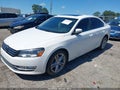 2013 Volkswagen Passat — photo 2 of 15 | VIN 1VWCM7A31DC045940