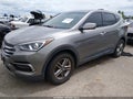2017 Hyundai Santa Fe — photo 2 of 16 | VIN 5NMZTDLB3HH029748