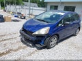 2009 Honda Fit — photo 13 of 15 | VIN JHMGE87229S039520