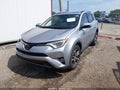 2018 Toyota RAV4 — photo 2 of 18 | VIN 2T3WFREV5JW512724