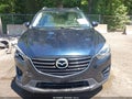 2016 Mazda CX-5 — photo 12 of 16 | VIN JM3KE4DY6G0623903