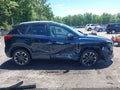 2016 Mazda CX-5 — photo 13 of 16 | VIN JM3KE4DY6G0623903