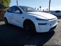 2026 Tesla Model Y — photo 1 of 16 | VIN 7SAYGDEE5TF411414