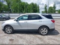 2018 Chevrolet Equinox — photo 14 of 18 | VIN 2GNAXMEV6J6230962