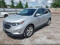 2018 Chevrolet Equinox — photo 2 of 18 | VIN 2GNAXMEV6J6230962