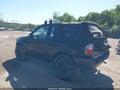 2001 Isuzu Rodeo — photo 3 of 11 | VIN 4S2CM57WX14305173