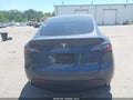 2023 Tesla Model Y — photo 17 of 22 | VIN 7SAYGDEE1PF695050