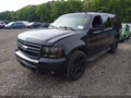 2010 Chevrolet Suburban 1500 — photo 2 of 11 | VIN 1GNUKJE31AR146710