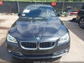 2014 BMW 5 Series — photo 13 of 17 | VIN WBA5B3C59ED532837