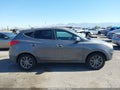 2014 Hyundai Tucson — photo 13 of 16 | VIN KM8JTCAF1EU890648