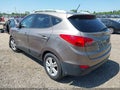 2011 Hyundai Tucson — photo 3 of 15 | VIN KM8JU3AC9BU186082