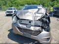 2011 Hyundai Tucson — photo 11 of 15 | VIN KM8JU3AC9BU186082