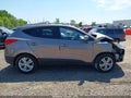 2011 Hyundai Tucson — photo 12 of 15 | VIN KM8JU3AC9BU186082