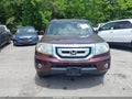 2011 Honda Pilot — photo 12 of 16 | VIN 5FNYF4H68BB008899