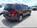 2011 Honda Pilot — photo 4 of 16 | VIN 5FNYF4H68BB008899
