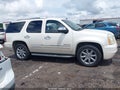 2011 GMC Yukon — photo 13 of 16 | VIN 1GKS2EEFXBR297214
