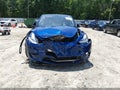 2023 Tesla Model Y — photo 6 of 21 | VIN 7SAYGDEE4PA086032