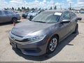 2018 Honda Civic — photo 2 of 17 | VIN 2HGFC2F54JH512861