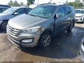 2014 Hyundai Santa Fe — photo 2 of 16 | VIN 5XYZU3LB3EG218770