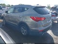 2014 Hyundai Santa Fe — photo 3 of 16 | VIN 5XYZU3LB3EG218770